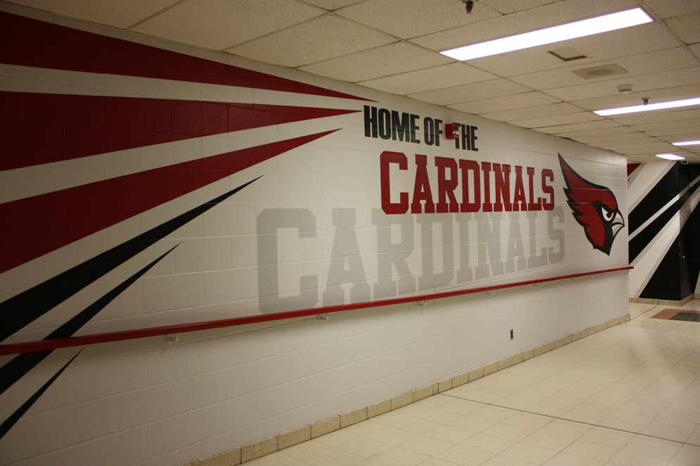 Picture of the school logo on a wall