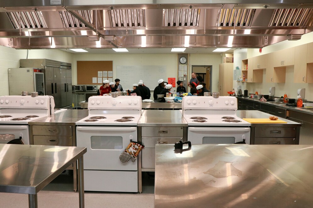 Picture of a kitchen with 3 ovens